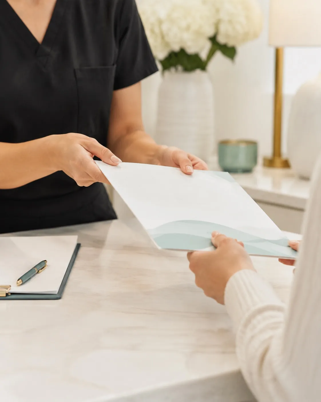 A client leaving a consultation with a written treatment plan