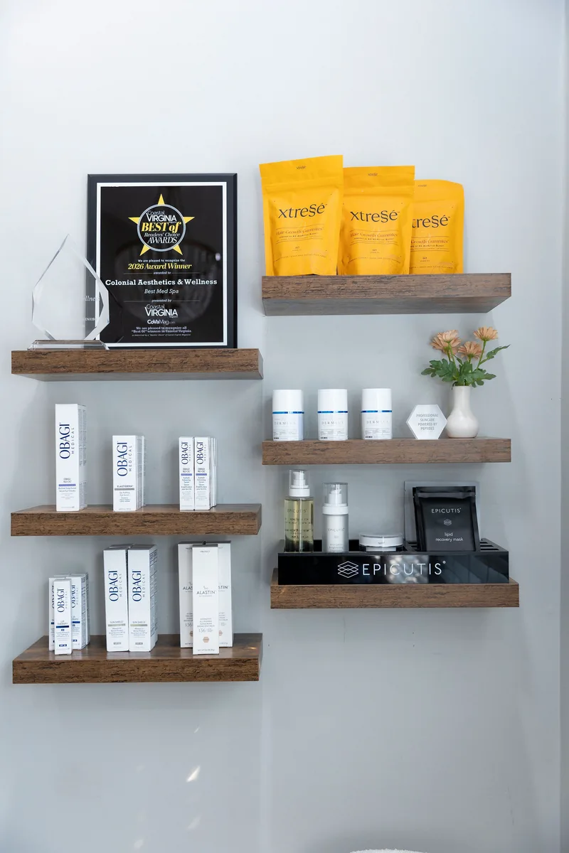 The Coastal Virginia Best of Readers' Choice 2026 Best Med Spa award beside shelves of Obagi, Alastin and Epicutis products